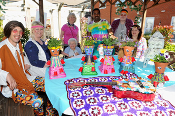 Care home residents put their green fingers to the test when they took part in a flower festival inspired by the RHS Chelsea Flower Show, creating unique flower displays to â€˜wowâ€™ a panel of judges.